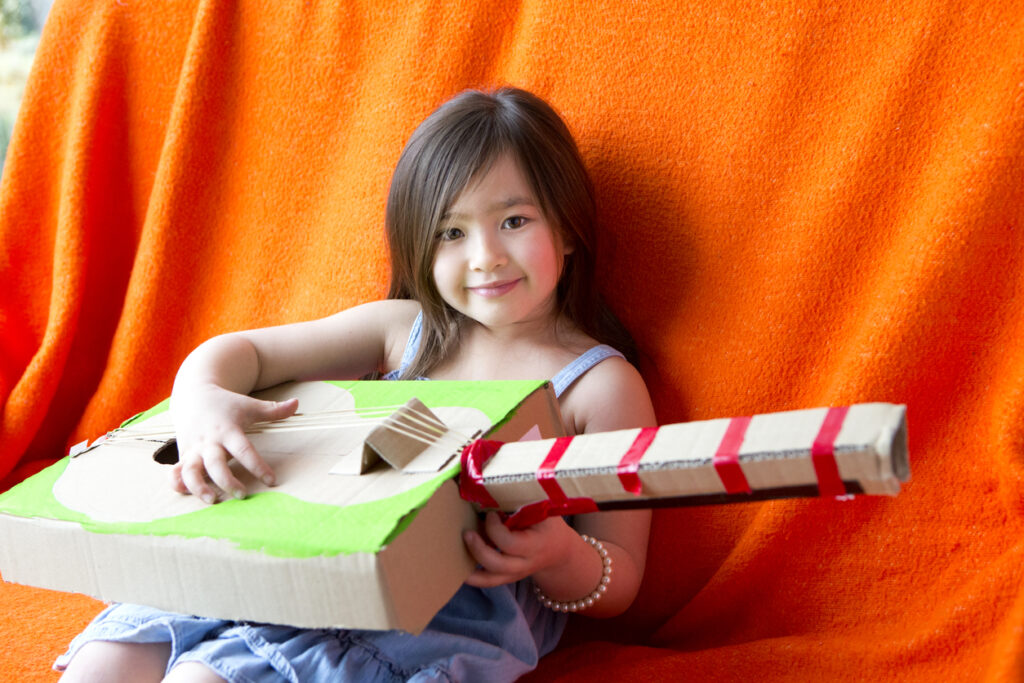 Girl Plays Guitar