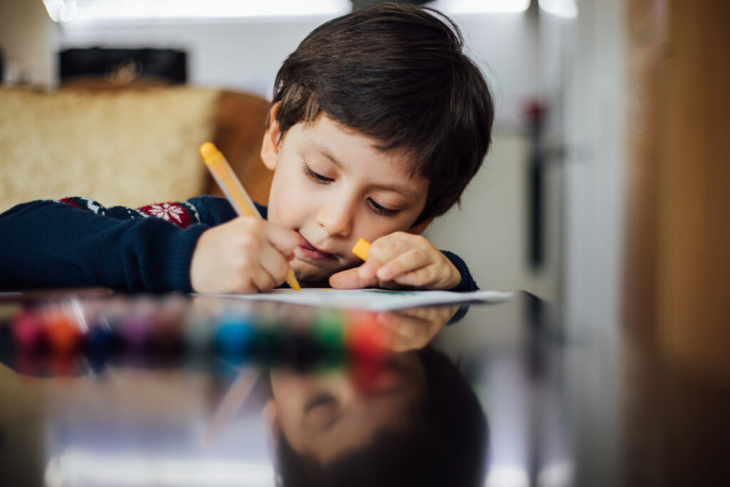 Little boy painting