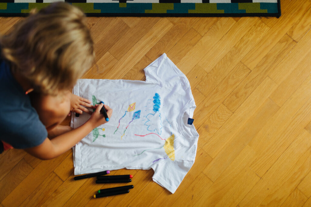 Little Girl Decorating T Shirt